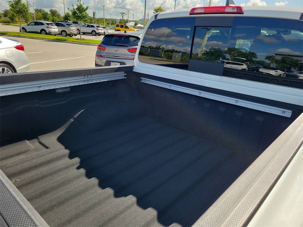 2025 Glacier White Nissan Frontier SV RWD Truck