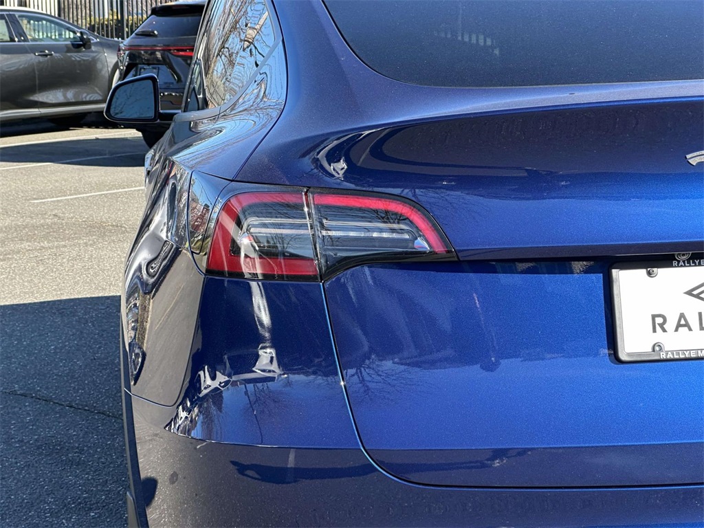 used 2023 Tesla Model Y car, priced at $30,495