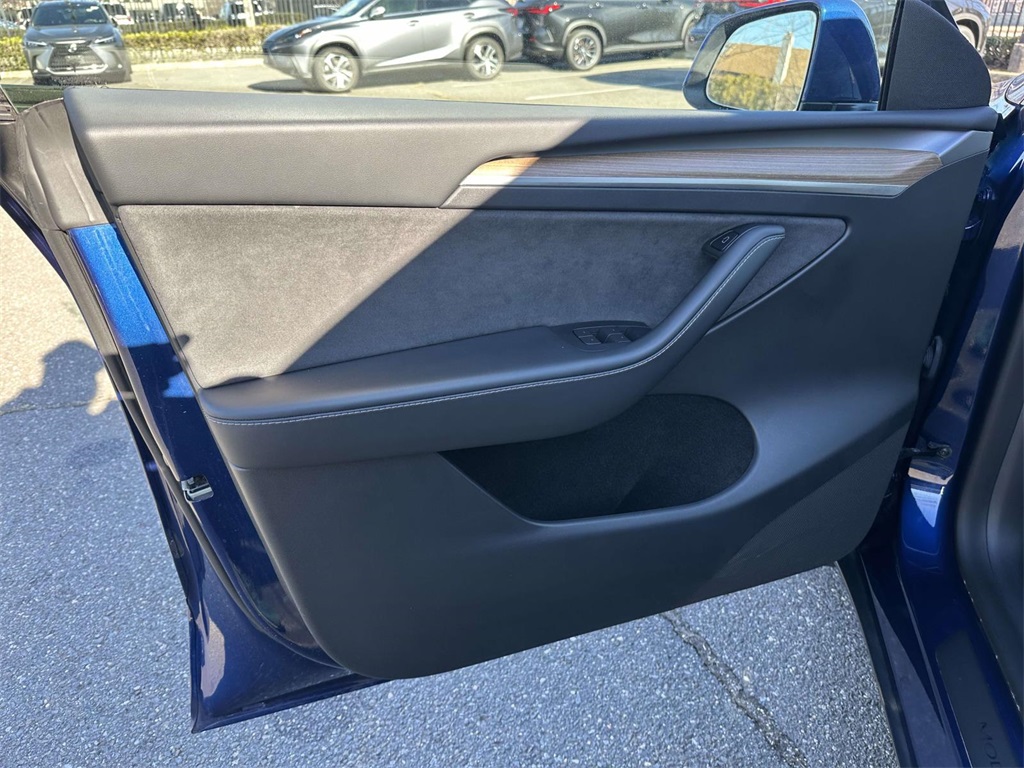 used 2023 Tesla Model Y car, priced at $30,495