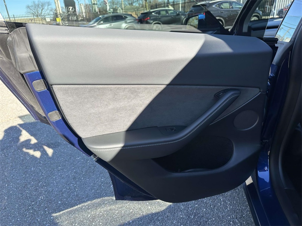 used 2023 Tesla Model Y car, priced at $30,495