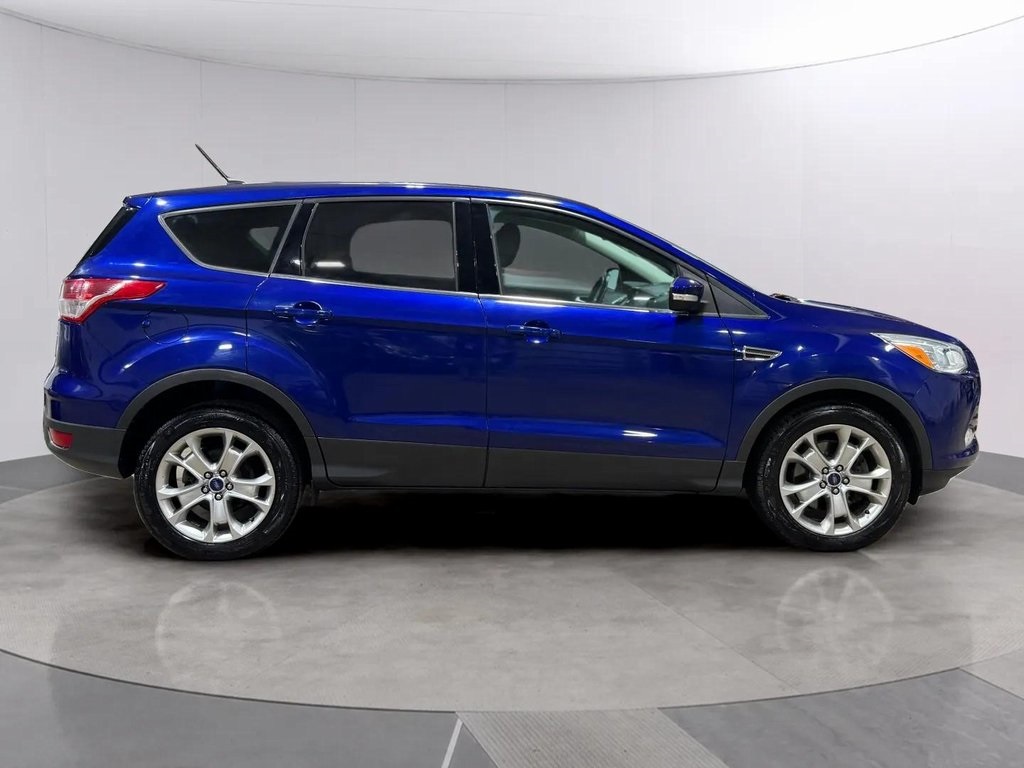 Used 2013 Ford Escape SEL with VIN 1FMCU9HX0DUD76277 for sale in Greenfield, WI