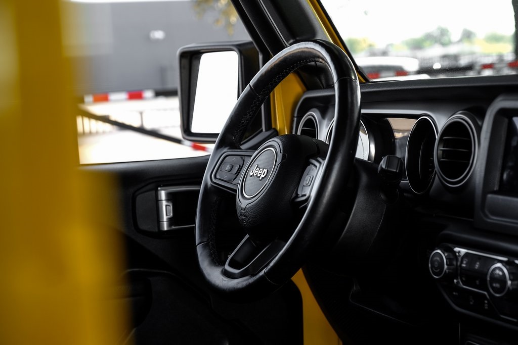 used 2021 Jeep Wrangler car, priced at $29,521