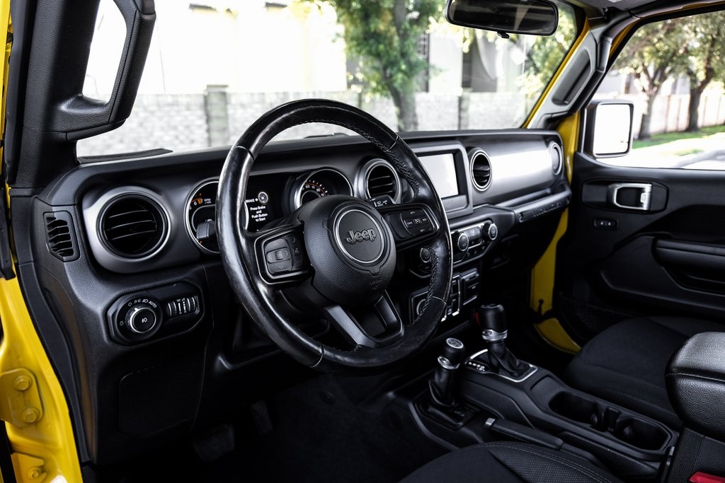 used 2021 Jeep Wrangler car, priced at $29,521