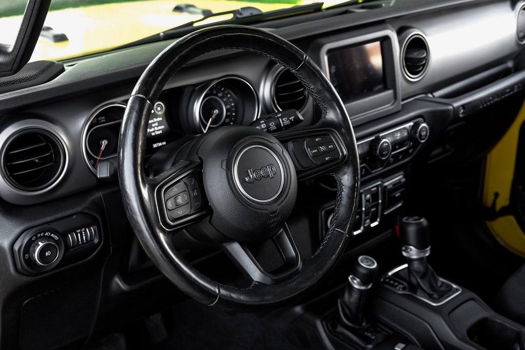 used 2021 Jeep Wrangler car, priced at $29,521