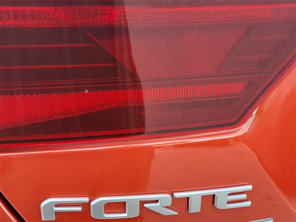 2023 Fire Orange Kia Forte LXS FWD Sedan