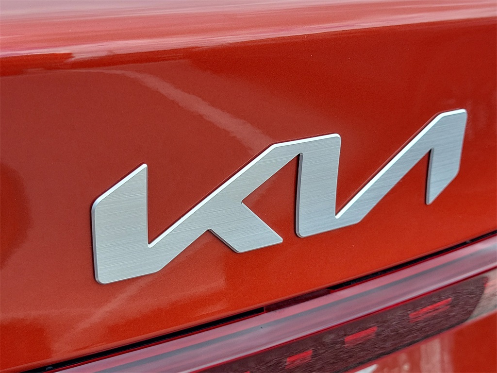 2023 Fire Orange Kia Forte LXS FWD Sedan