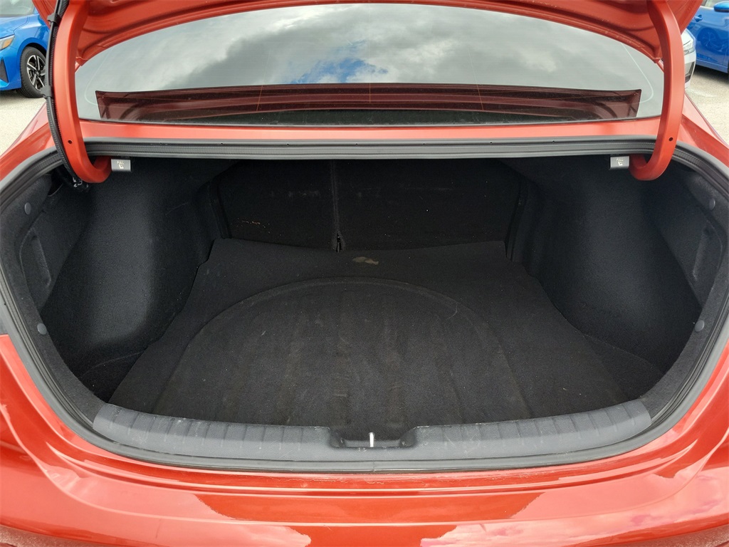 2023 Fire Orange Kia Forte LXS FWD Sedan