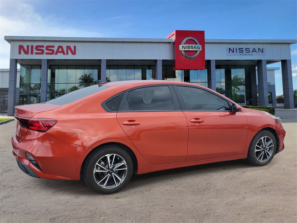 2023 Fire Orange Kia Forte LXS FWD Sedan