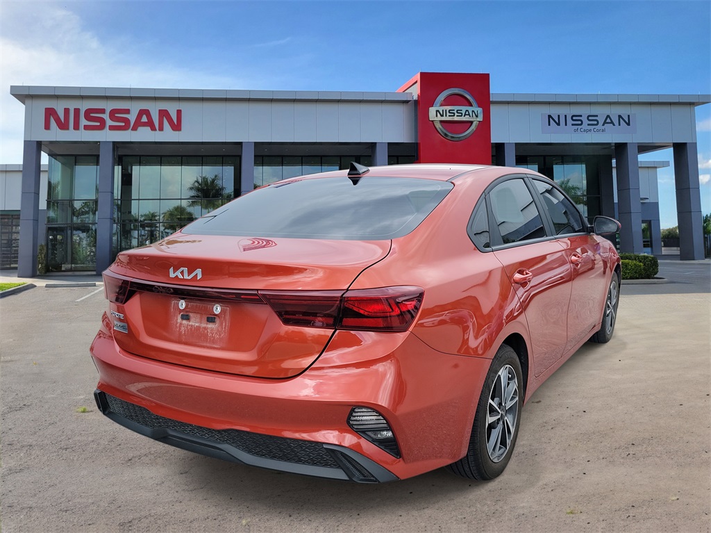 2023 Fire Orange Kia Forte LXS FWD Sedan