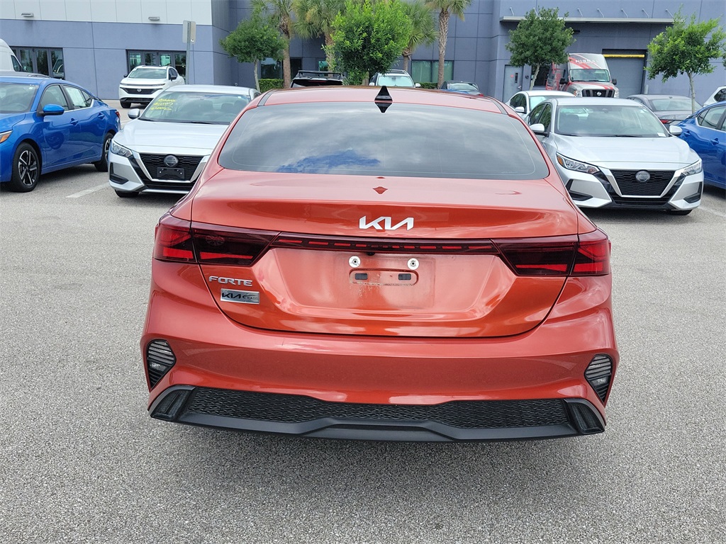 2023 Fire Orange Kia Forte LXS FWD Sedan