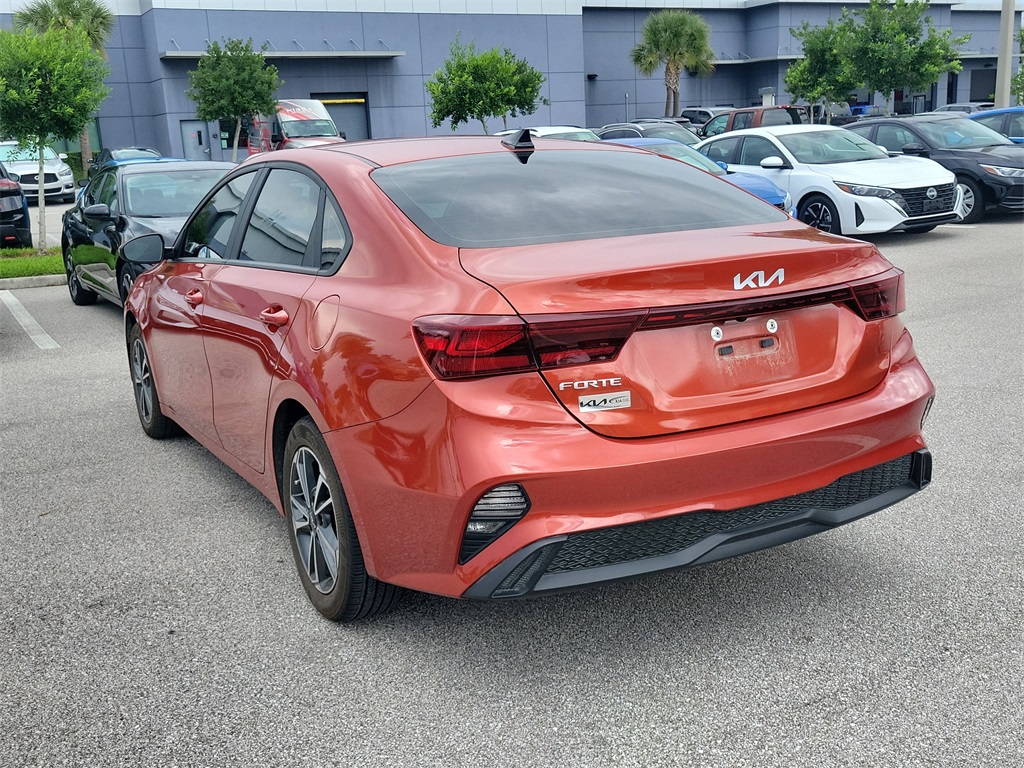 2023 Fire Orange Kia Forte LXS FWD Sedan