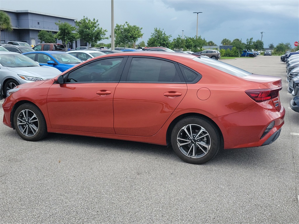 2023 Fire Orange Kia Forte LXS FWD Sedan