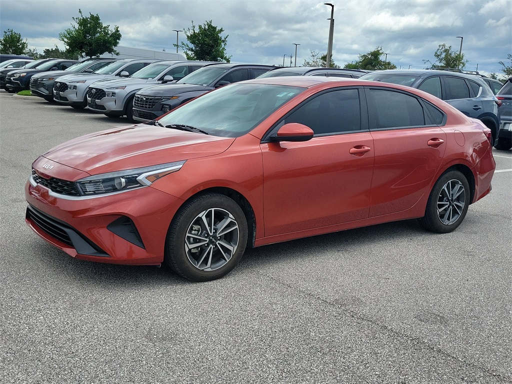 2023 Fire Orange Kia Forte LXS FWD Sedan