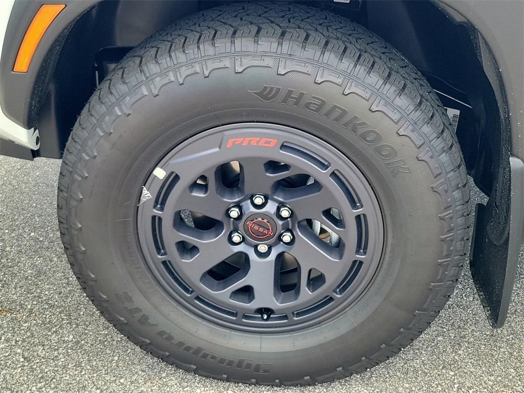 2025 Glacier White Nissan Frontier PRO-4X 4X4 Truck