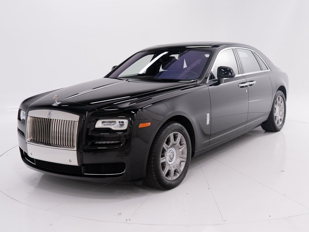 This 2014 Rolls-Royce Ghost is draped in sleek black with a pristine white  interior. With a 6.6L Twin-Turbo V12 engine purring beneath its hood, this  luxury sedan boasts cutting-edge features like ..., image size:1024x768