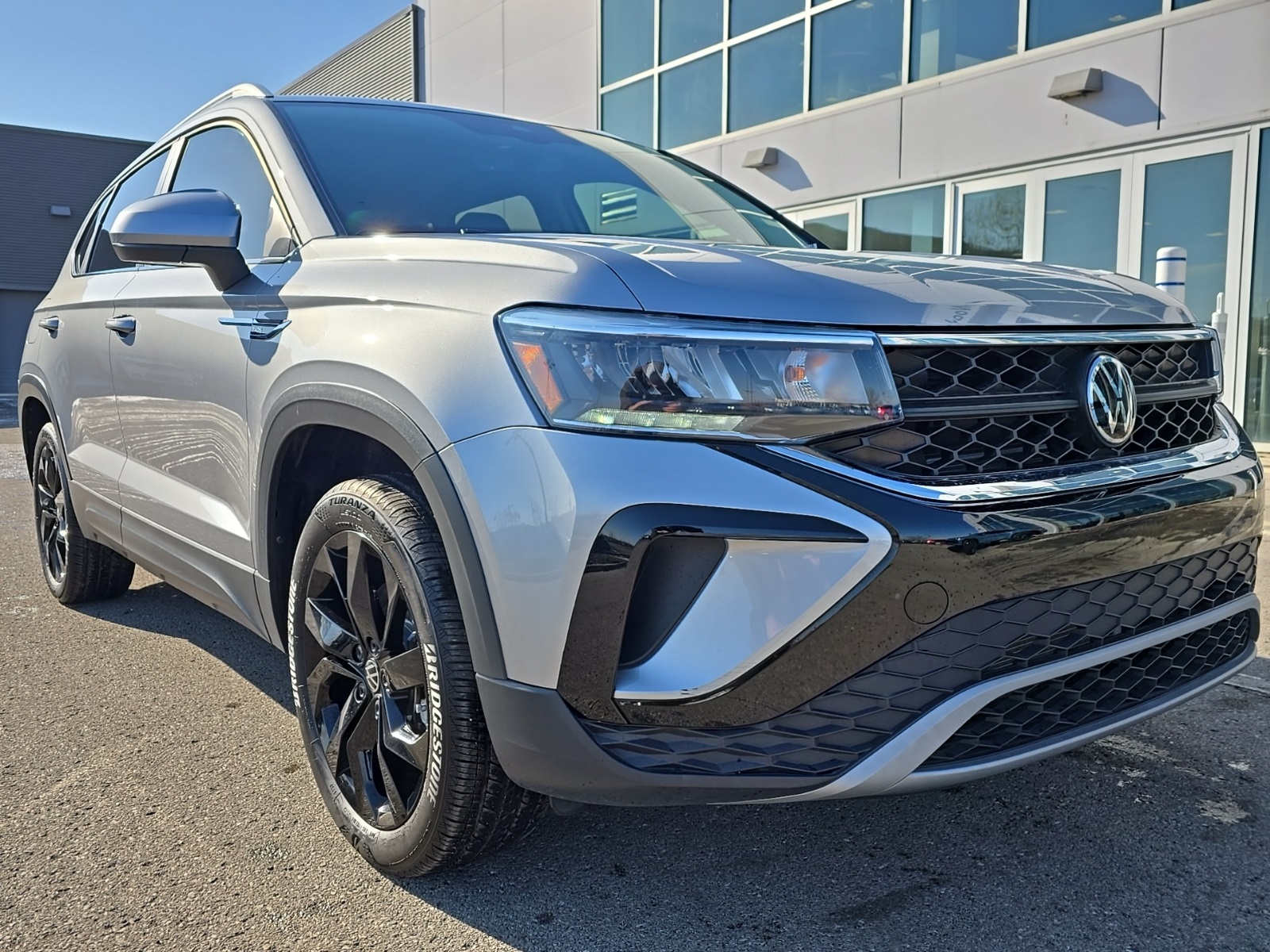 used 2023 Volkswagen Taos car, priced at $21,700