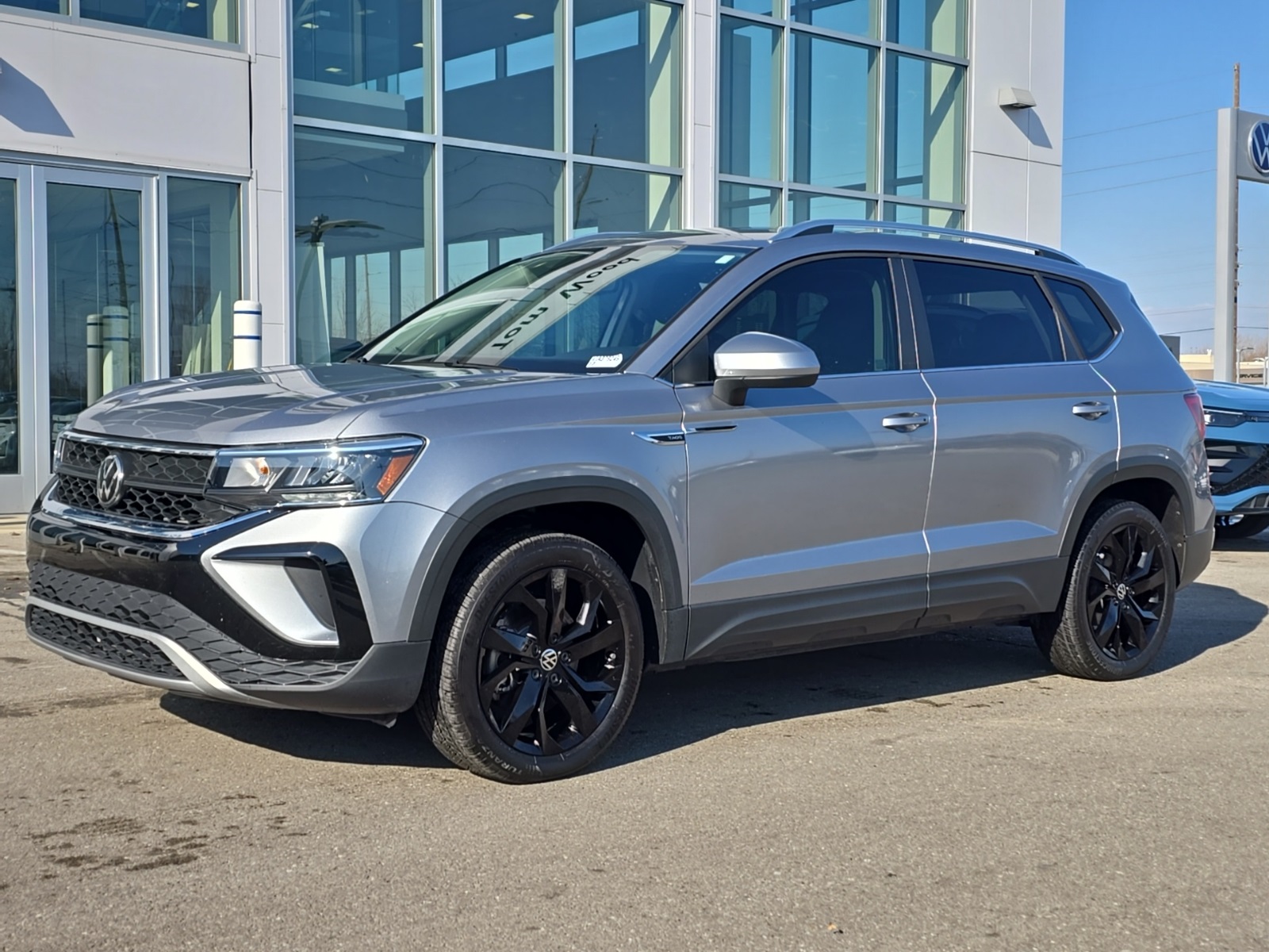 used 2023 Volkswagen Taos car, priced at $21,700