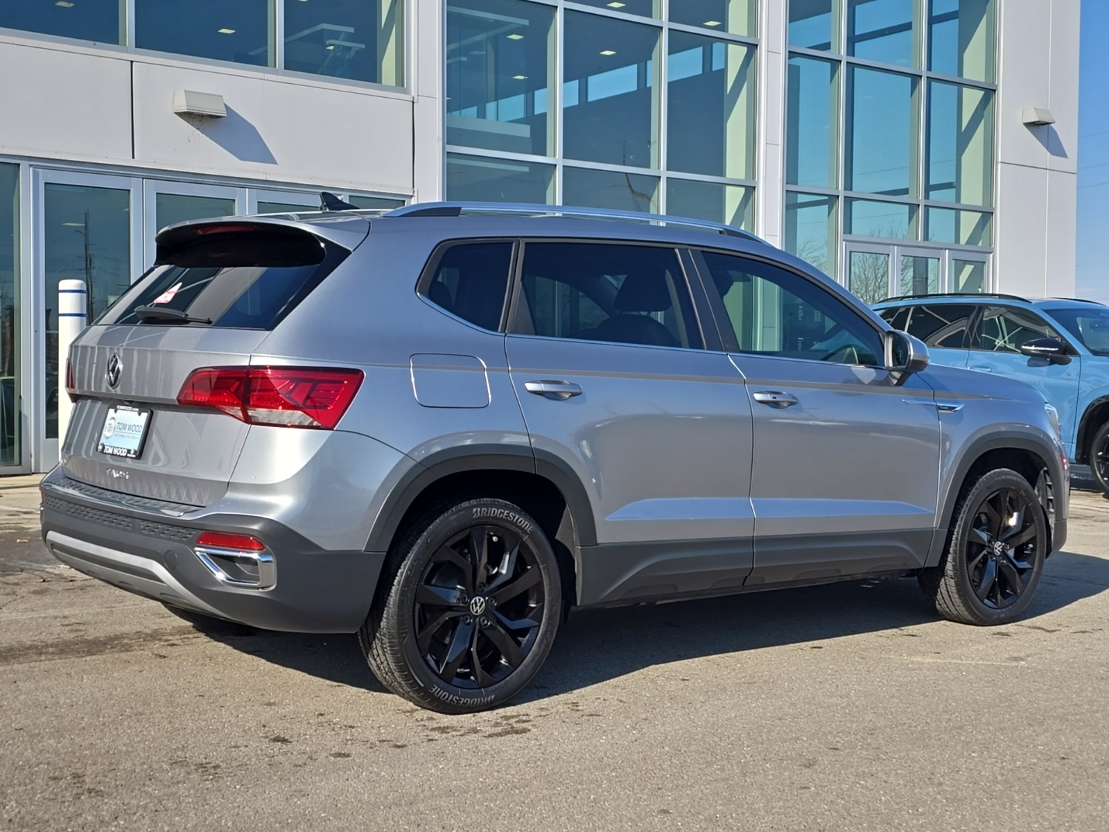 used 2023 Volkswagen Taos car, priced at $21,700