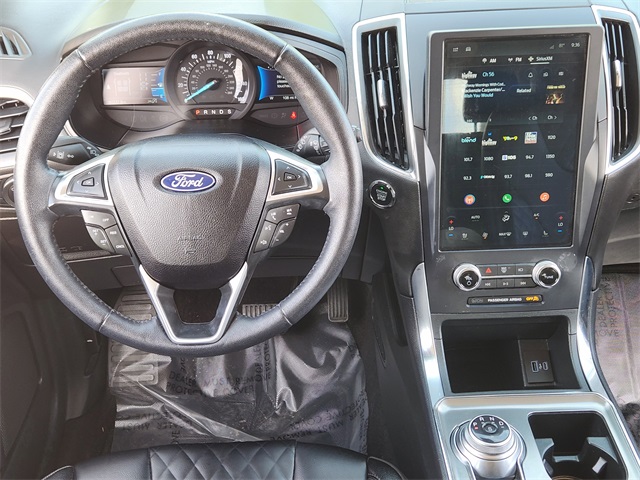 2023 Black Metallic Ford Edge Titanium AWD SUV