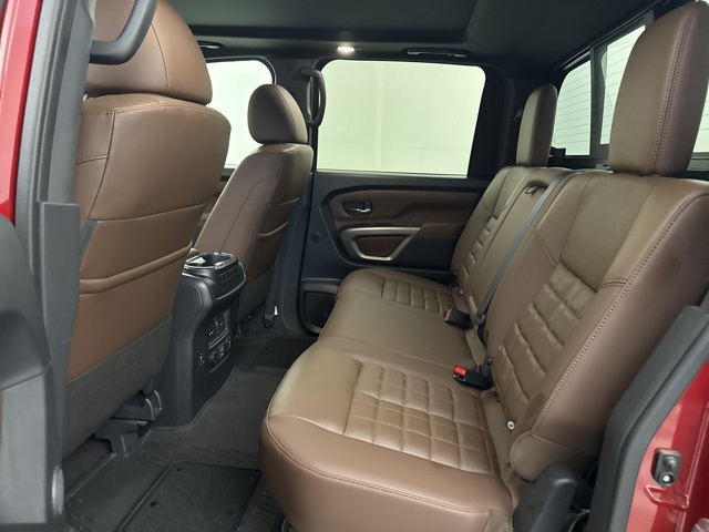2023 Cardinal Red Metallic Nissan Titan Platinum Reserve 4X4 Truck