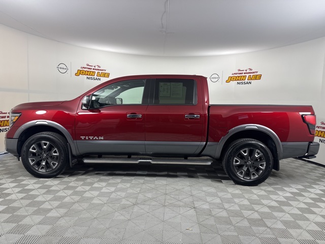 2023 Cardinal Red Metallic Nissan Titan Platinum Reserve 4X4 Truck