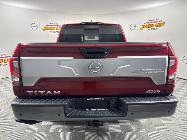 2023 Cardinal Red Metallic Nissan Titan Platinum Reserve 4X4 Truck