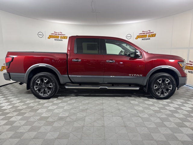 2023 Cardinal Red Metallic Nissan Titan Platinum Reserve 4X4 Truck