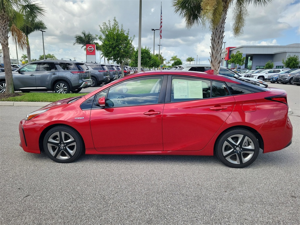 2019 Red Toyota Prius L FWD Hatchback