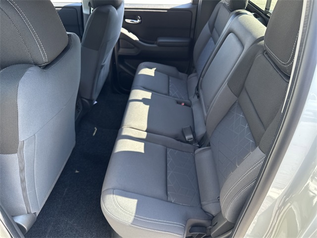 2025 Glacier White Nissan Frontier SV RWD Truck