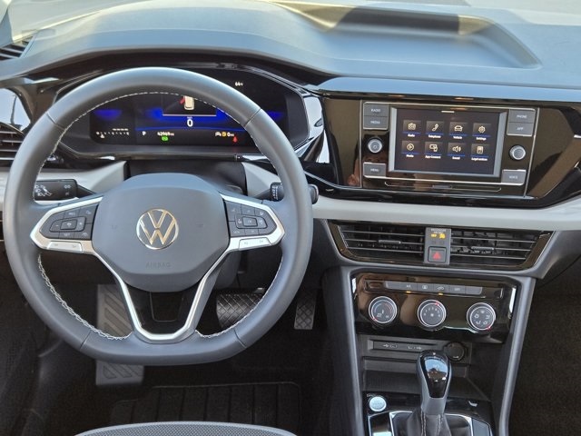 used 2023 Volkswagen Taos car, priced at $17,990