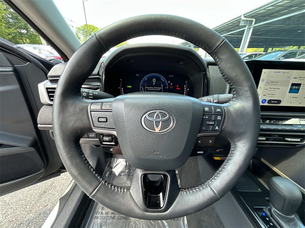 2025 Midnight Black Metallic Toyota Camry LE AWD Sedan