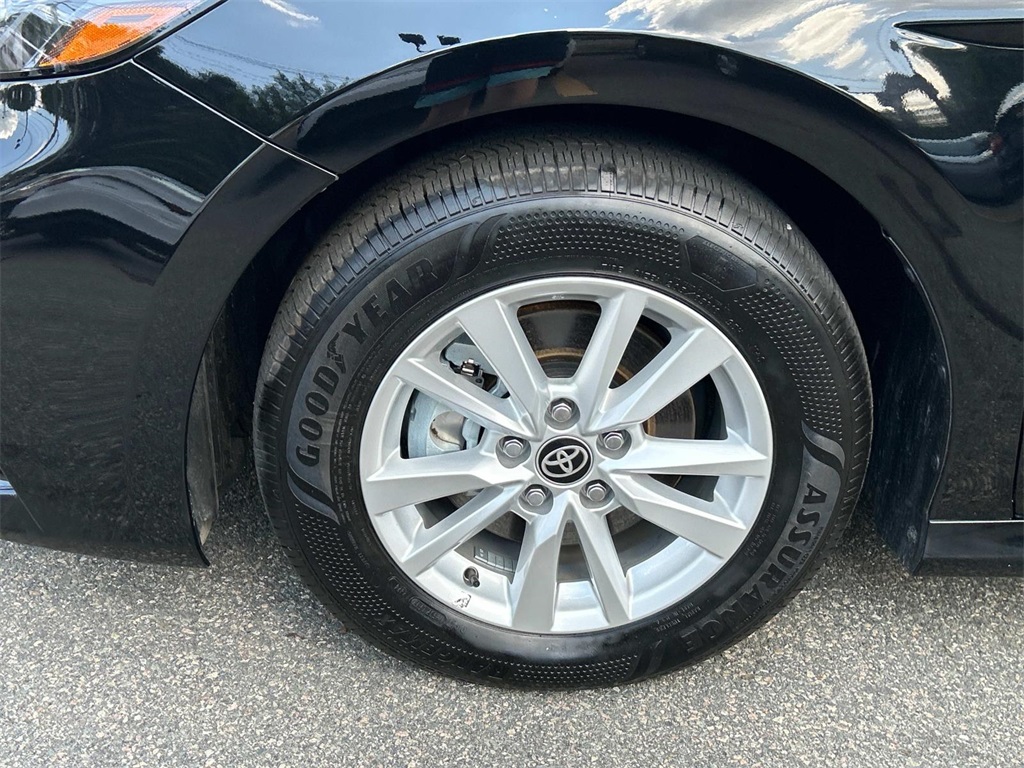 2025 Midnight Black Metallic Toyota Camry LE AWD Sedan