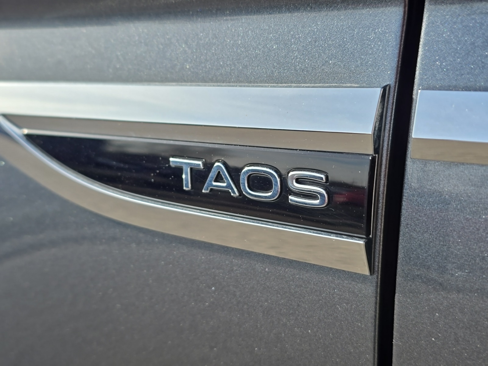 used 2023 Volkswagen Taos car, priced at $20,200