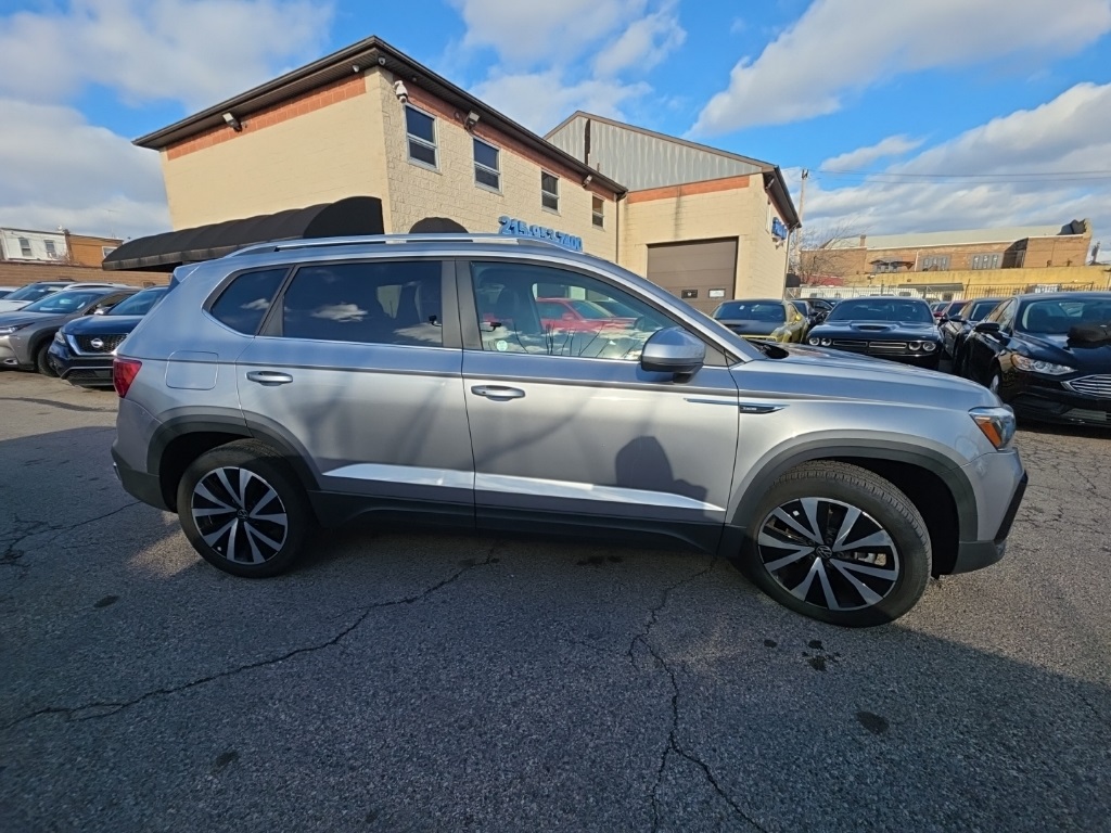 used 2023 Volkswagen Taos car, priced at $19,895