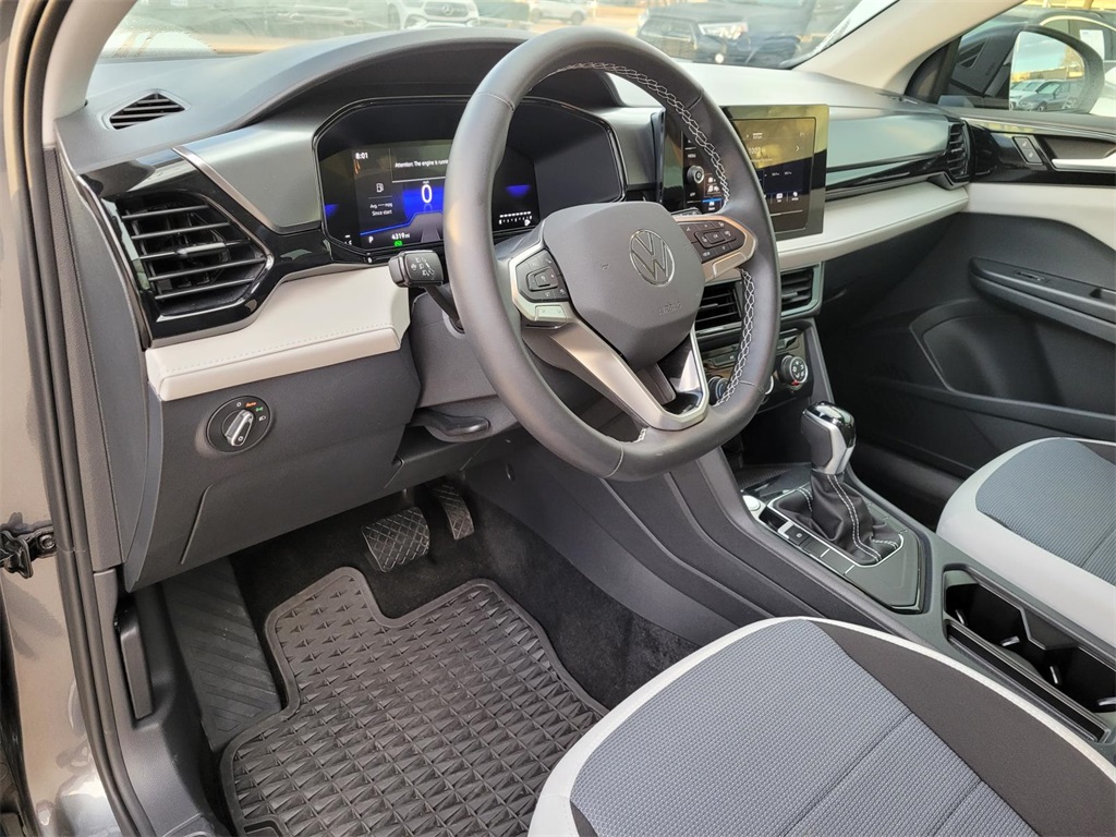 used 2025 Volkswagen Taos car, priced at $23,200