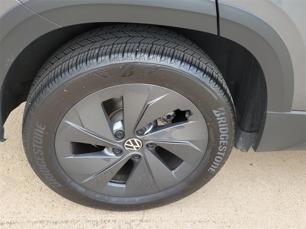 used 2025 Volkswagen Taos car, priced at $23,200