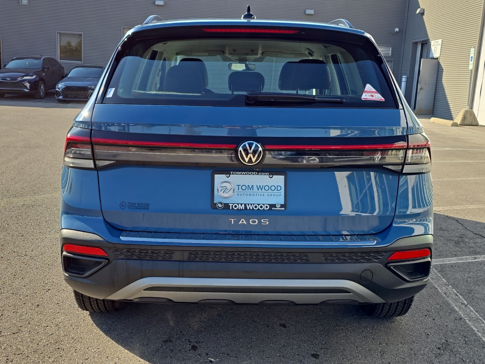 used 2025 Volkswagen Taos car, priced at $21,500