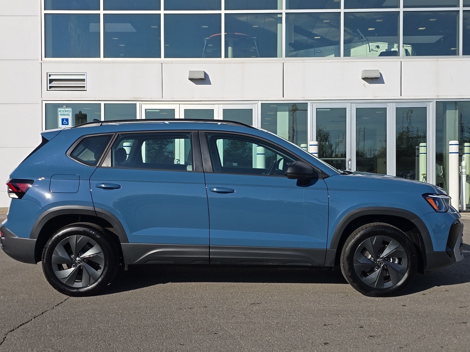 used 2025 Volkswagen Taos car, priced at $21,500