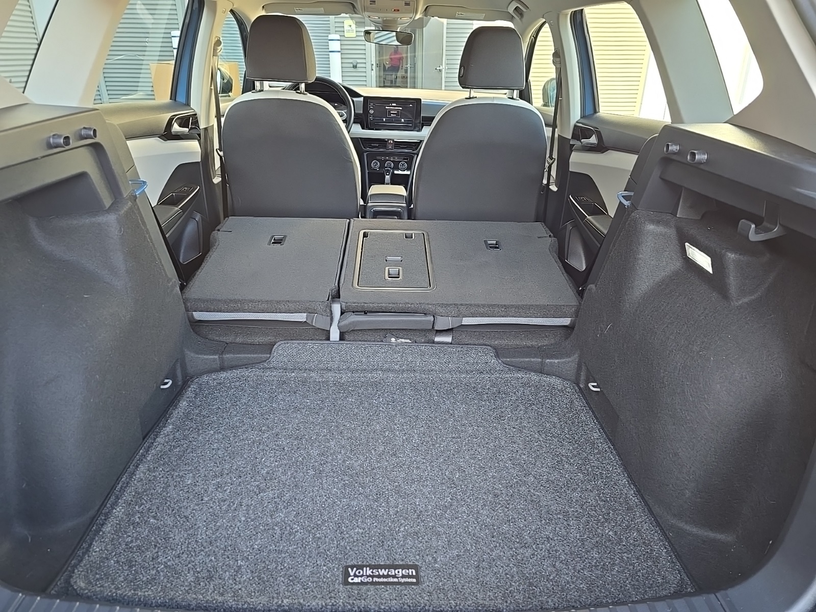 used 2025 Volkswagen Taos car, priced at $21,500