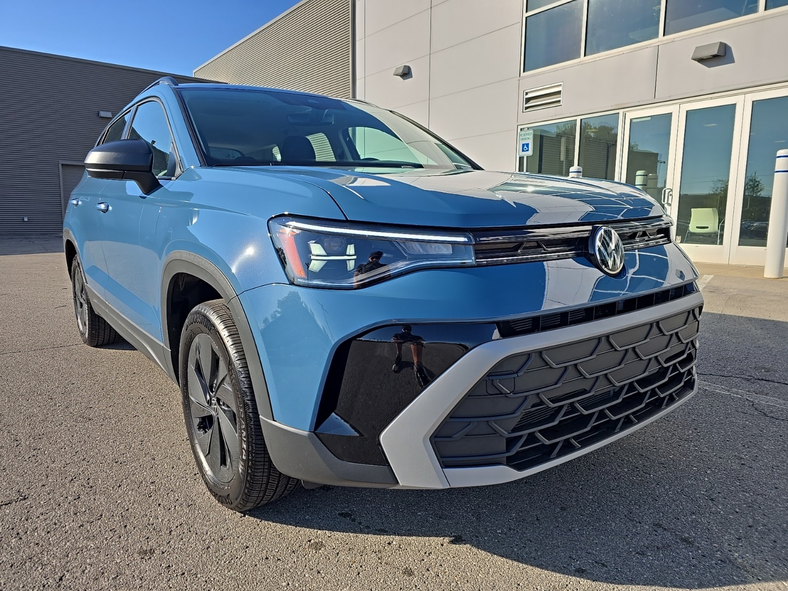 used 2025 Volkswagen Taos car, priced at $21,500