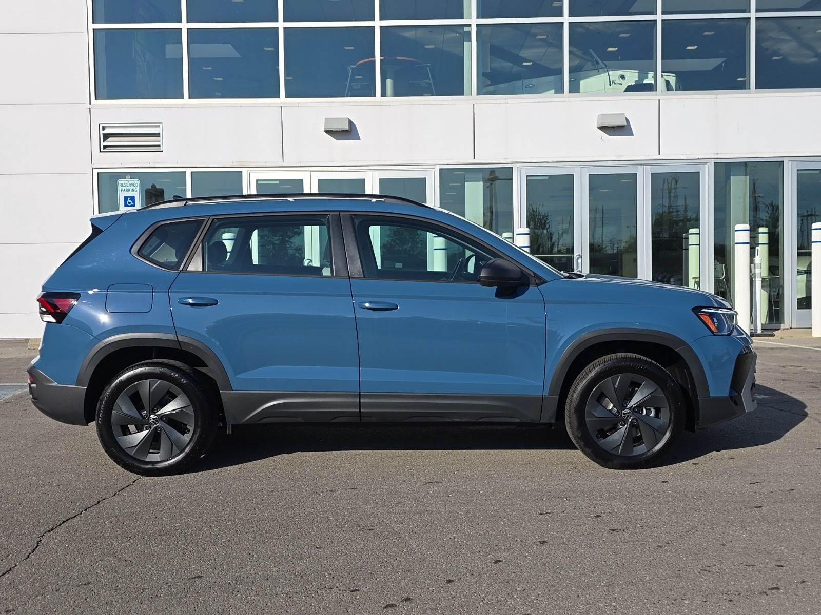 used 2025 Volkswagen Taos car, priced at $21,500