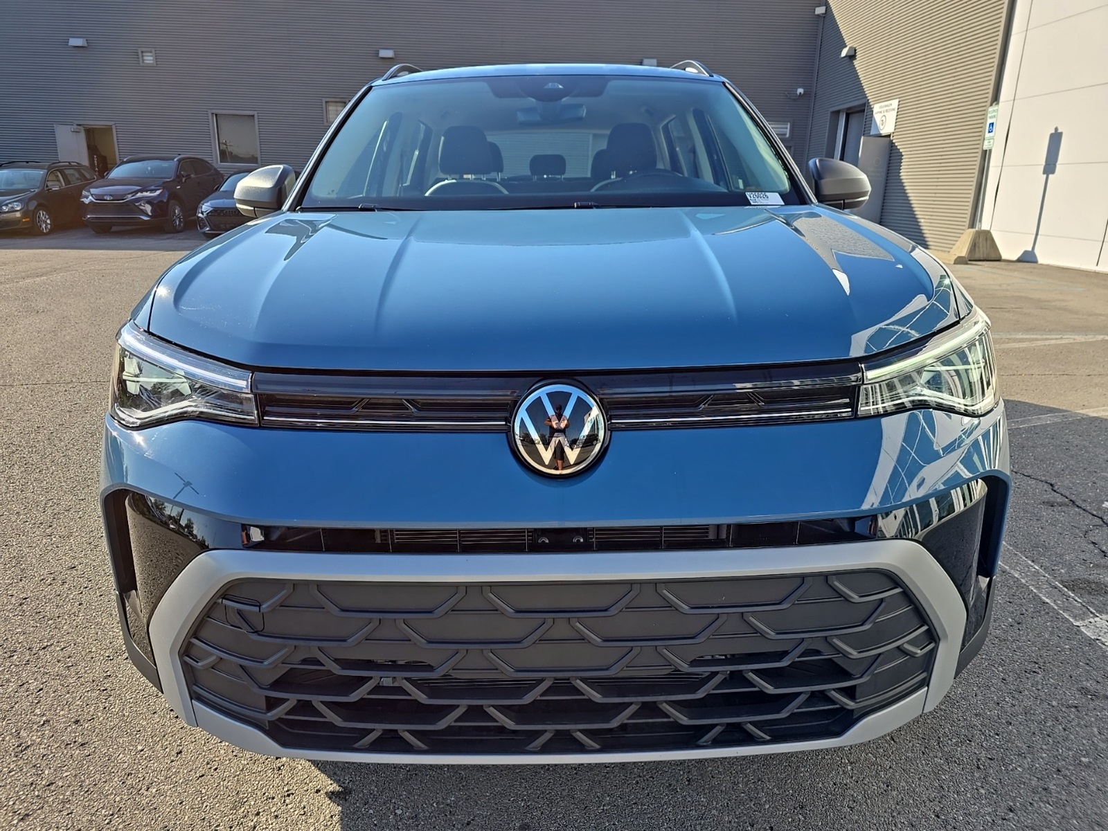 used 2025 Volkswagen Taos car, priced at $21,500