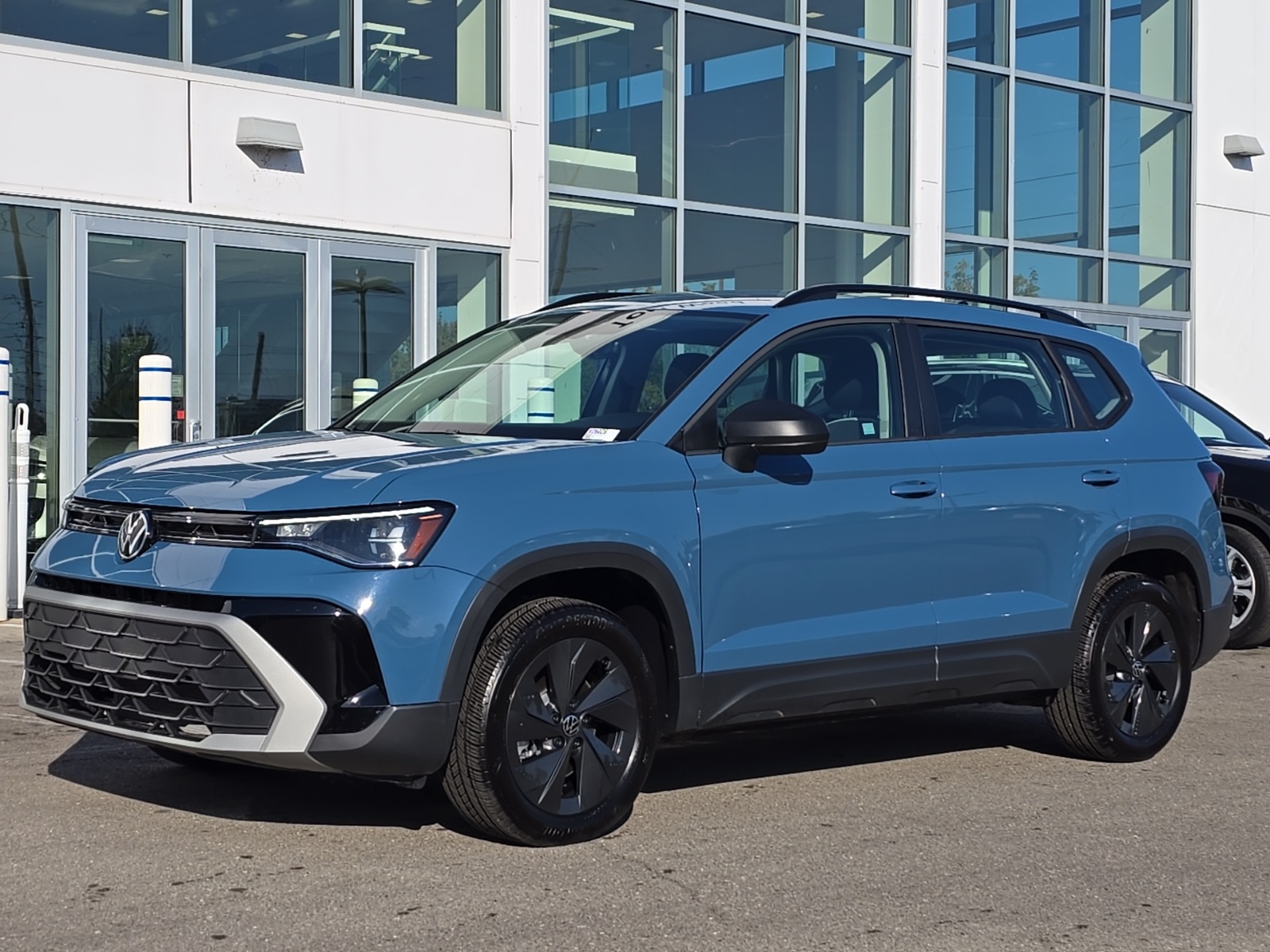 used 2025 Volkswagen Taos car, priced at $21,500