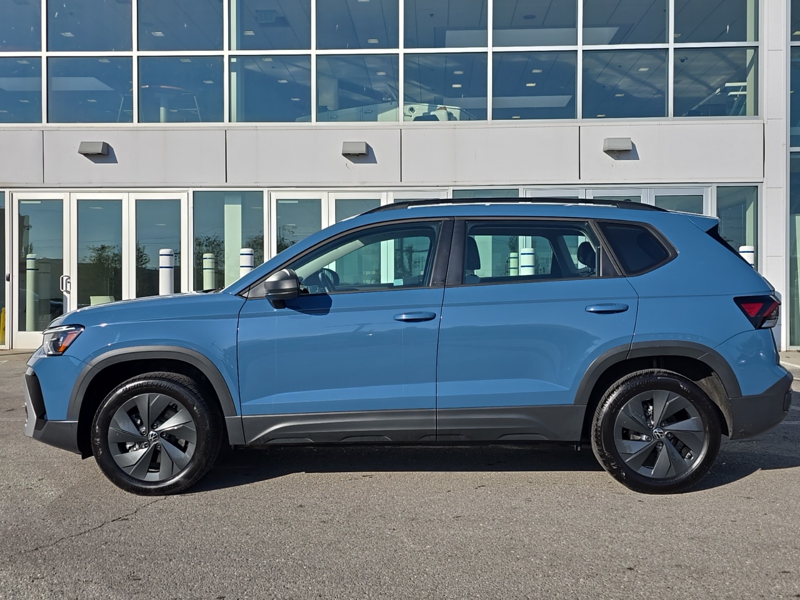 used 2025 Volkswagen Taos car, priced at $21,500