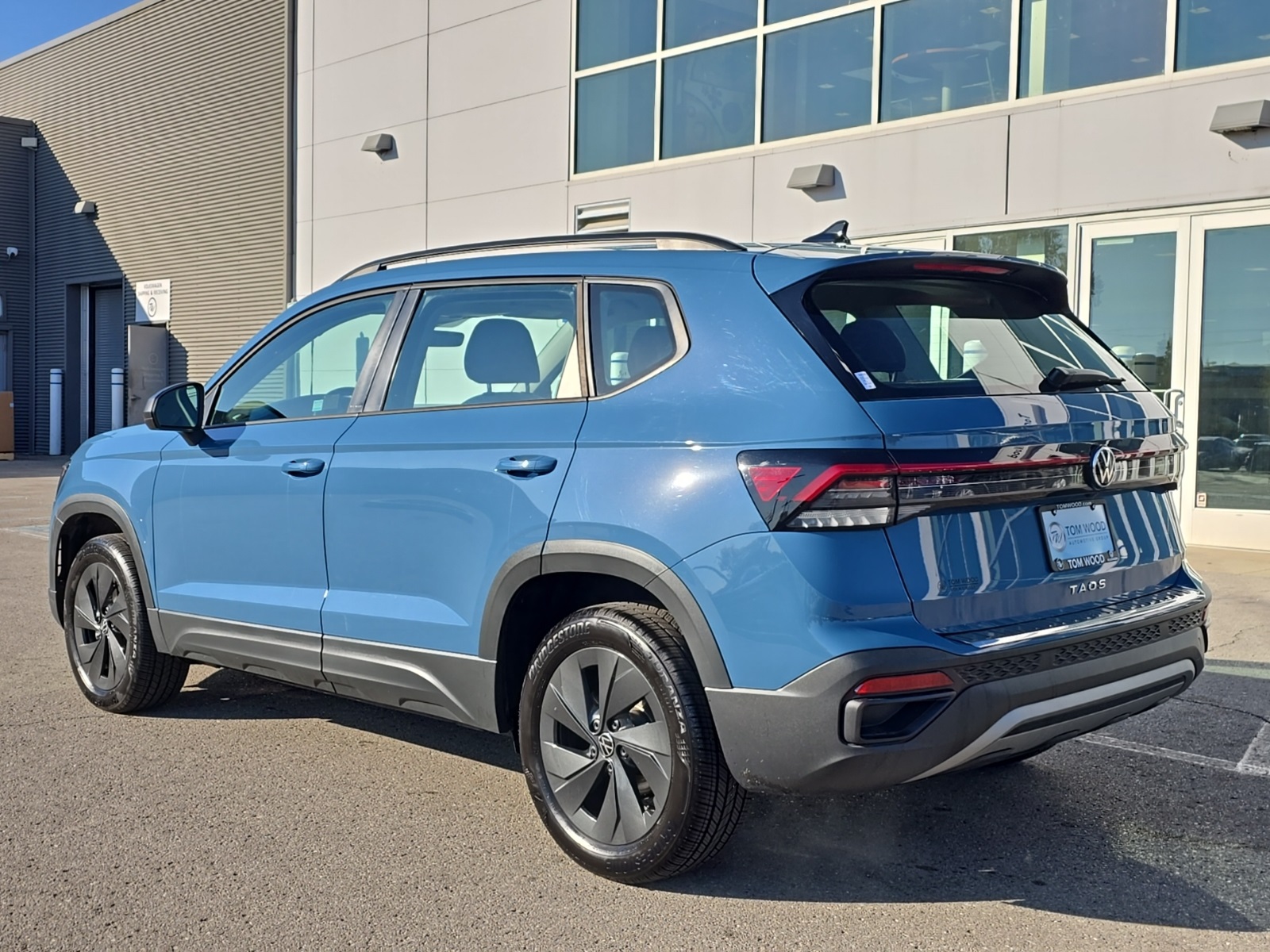 used 2025 Volkswagen Taos car, priced at $21,500