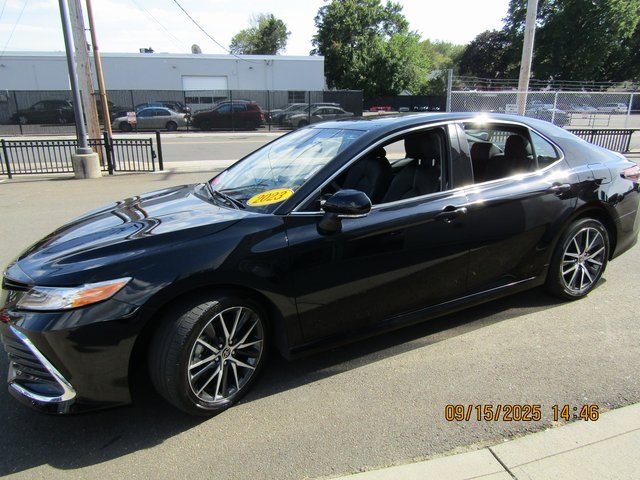 used 2023 Toyota Camry Hybrid car, priced at $29,999
