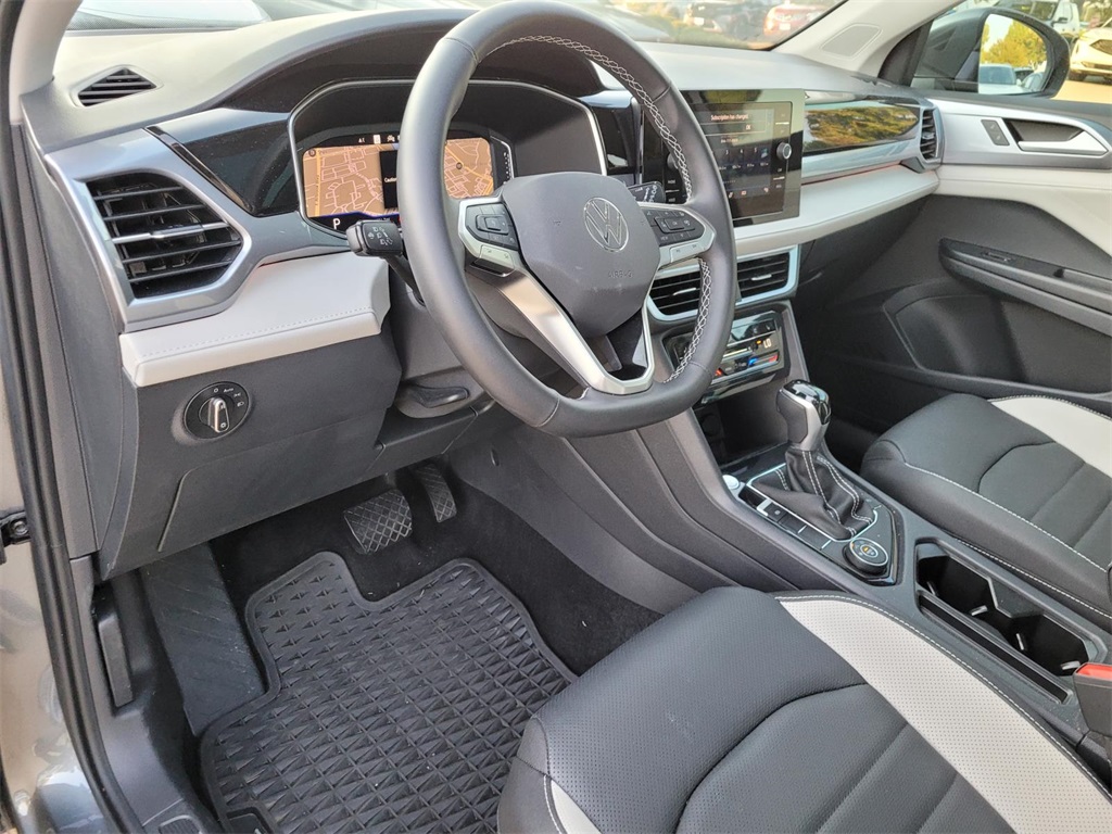 used 2025 Volkswagen Taos car, priced at $33,525