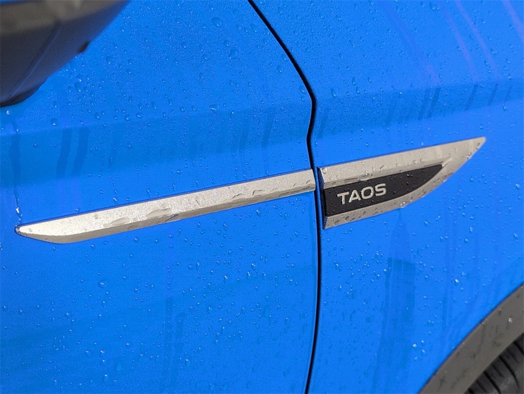 used 2022 Volkswagen Taos car, priced at $17,000