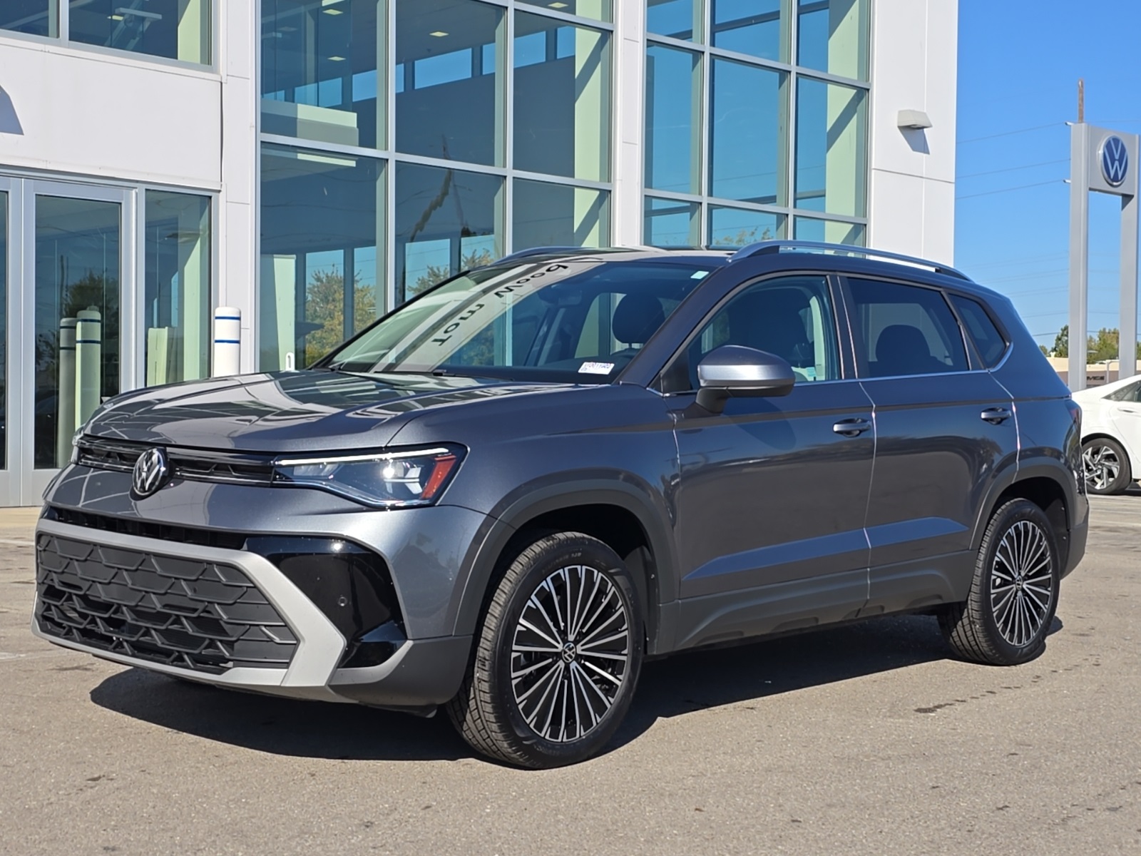 used 2025 Volkswagen Taos car, priced at $27,200