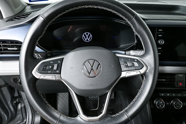 used 2024 Volkswagen Taos car, priced at $23,300